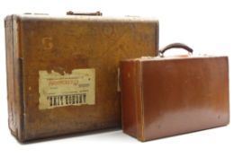 Vintage American leather suitcase by The Travellers Luggage Co bearing a label for Sir Alexander