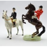 Beswick model of a Huntsman on a rearing brown horse No.