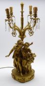 Gilt metal four branch table lamp hung with spear cut lustre drops,