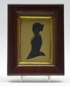 19th Century half length silhouette of a lady with ringlets highlighted in gilt and in rosewood