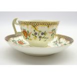 Early 19th Century Swansea tea cup and saucer of London shape decorated with floral sprays and with