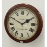 20th century mahogany circular station type wall clock, Roman dial signed 'Batty, Manchester',