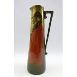 Tall tapered jug decorated in the Kingsware style with The Night Watchman on green and gilt ground,