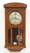 Early 20th century stained beech cased wall hanging clock, silvered Arabic dial,