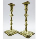 Pair of 19th Century silver shape brass candlesticks with push up ejectors and square bases H26cms