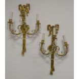 Pair 18th century design gilt metal three branch wall lights with tied bow decoration and hung with