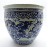 Large 20th Century Chinese blue and white jardiniere decorated with dragons, flowers etc H36cms,