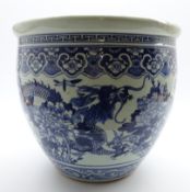 Large 20th Century Chinese blue and white jardiniere decorated with dragons, flowers etc H36cms,