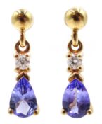 Pair of 9ct gold tanzanite and diamond pendant earrings,