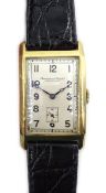 International Watch Co 14ct gold 'curvex' wristwatch, c.
