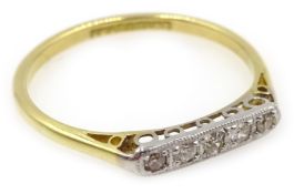 Five stone diamond rim set gold ring,