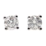 Pair of 18ct white gold diamond stud earrings, stamped 750, diamonds total 0.