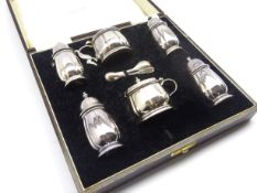 Silver double condiment set of fluted circular design in fitted case Birmingham 1938,