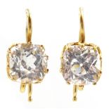 Pair of early 20th century 18ct gold (tested) white stone, possibly zircon earrings,