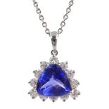 18ct white gold tanzanite and diamond cluster pendant, stamped 750 on platinum chain necklace,