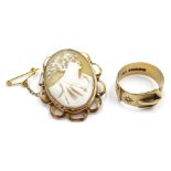 9ct gold buckle ring set with a diamond, Birmingham 1937 and a gold mounted cameo brooch,