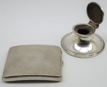 Silver circular inkwell with hinged cover Birmingham 1910 and an engraved silver cigarette case