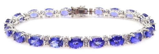 18ct white gold oval tanzanite and round brilliant cut diamond bracelet,