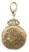 9ct gold locket with engraved decoration,