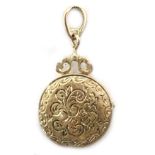 9ct gold locket with engraved decoration,