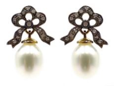 Pair of pearl and diamond pendant bow earrings Condition Report & Further Details
