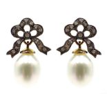 Pair of pearl and diamond pendant bow earrings Condition Report & Further Details