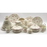 Quantity of Furnivals pink Denmark pattern dinner and tea ware with plates in various sizes,
