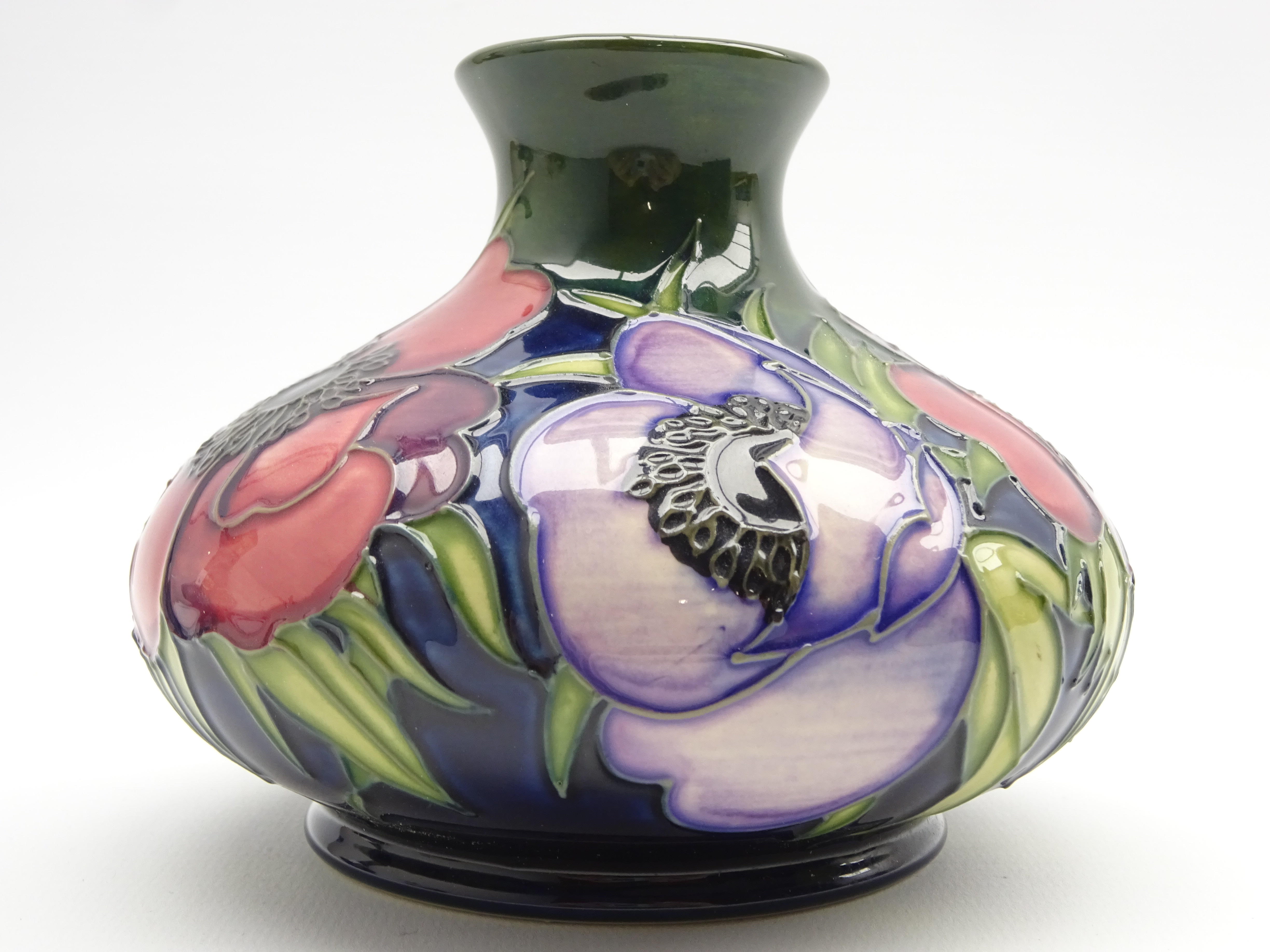 Moorcroft squat circular vase decorated in the 'Anemone Tribute' pattern by Emma Bossons H10cm