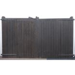 Pair of solid pine slatted driveway gates, pedestrian door, wrought metal strap hinges,