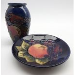 Moorcroft baluster vase in the 'Blue Finch' pattern H10cm and a matching saucer dish D11.