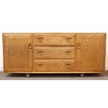 Ercol light elm sideboard, two cupboards and three drawers, W156cm, H68cm,
