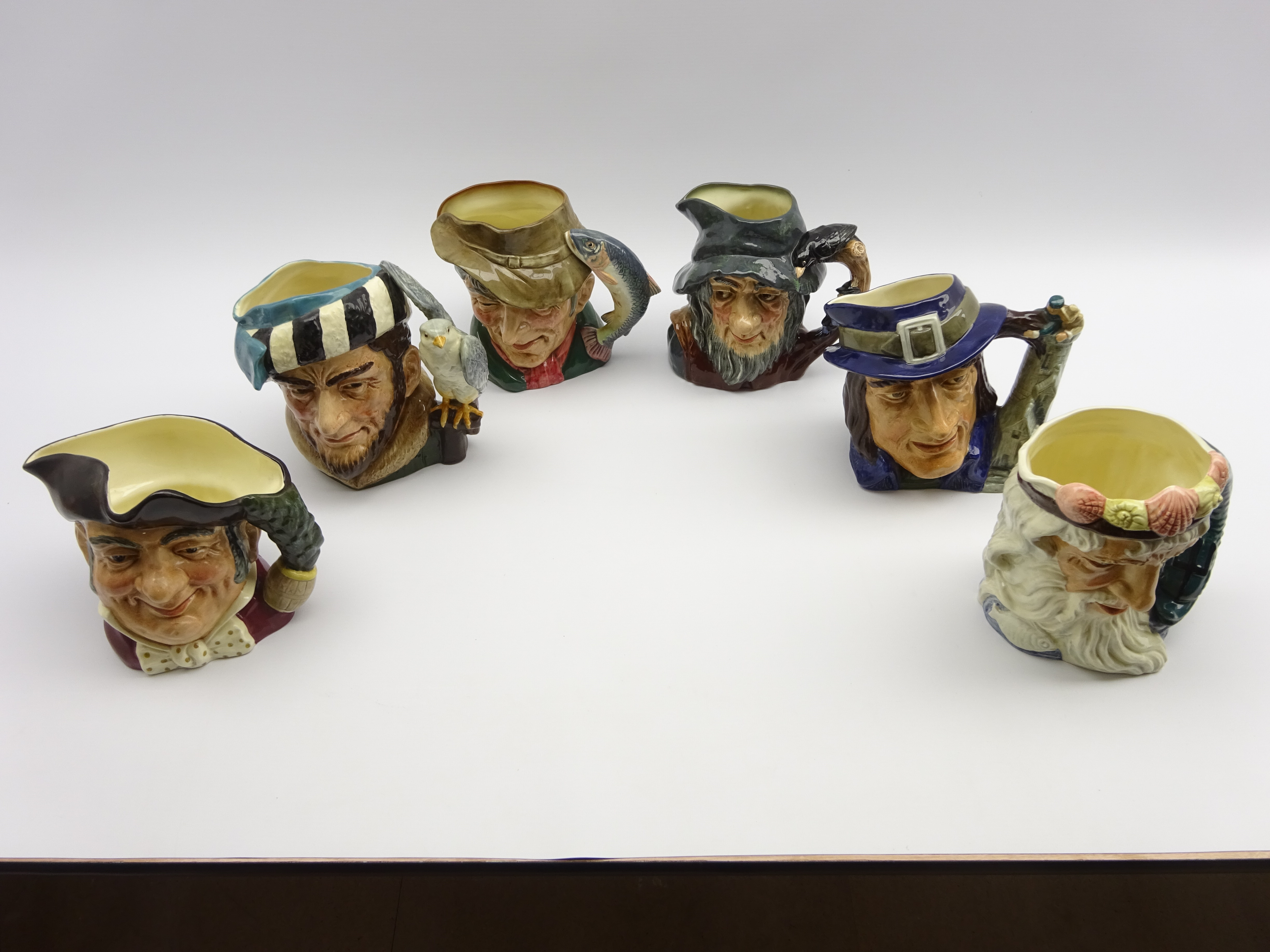 Six Royal Doulton Character jugs: The Falconer, The Poacher, Gulliver, Rip Van Winkle, - Image 2 of 2