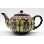 Walter Moorcroft teapot decorated in the Violet pattern, designed by Sally Tuffin,