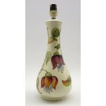 Moorcroft table lamp decorated with the Fuchsia pattern on a cream ground H31cm