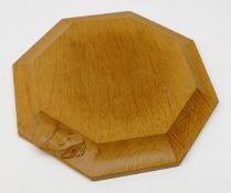 Mouseman oak octagonal teapot stand by Robert Thompson of Kilburn with carved mouse signature W19cm