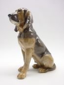 Royal Copenhagen Bing & Grondahl seated bloodhound, modelled by Lauritz Jensen No.