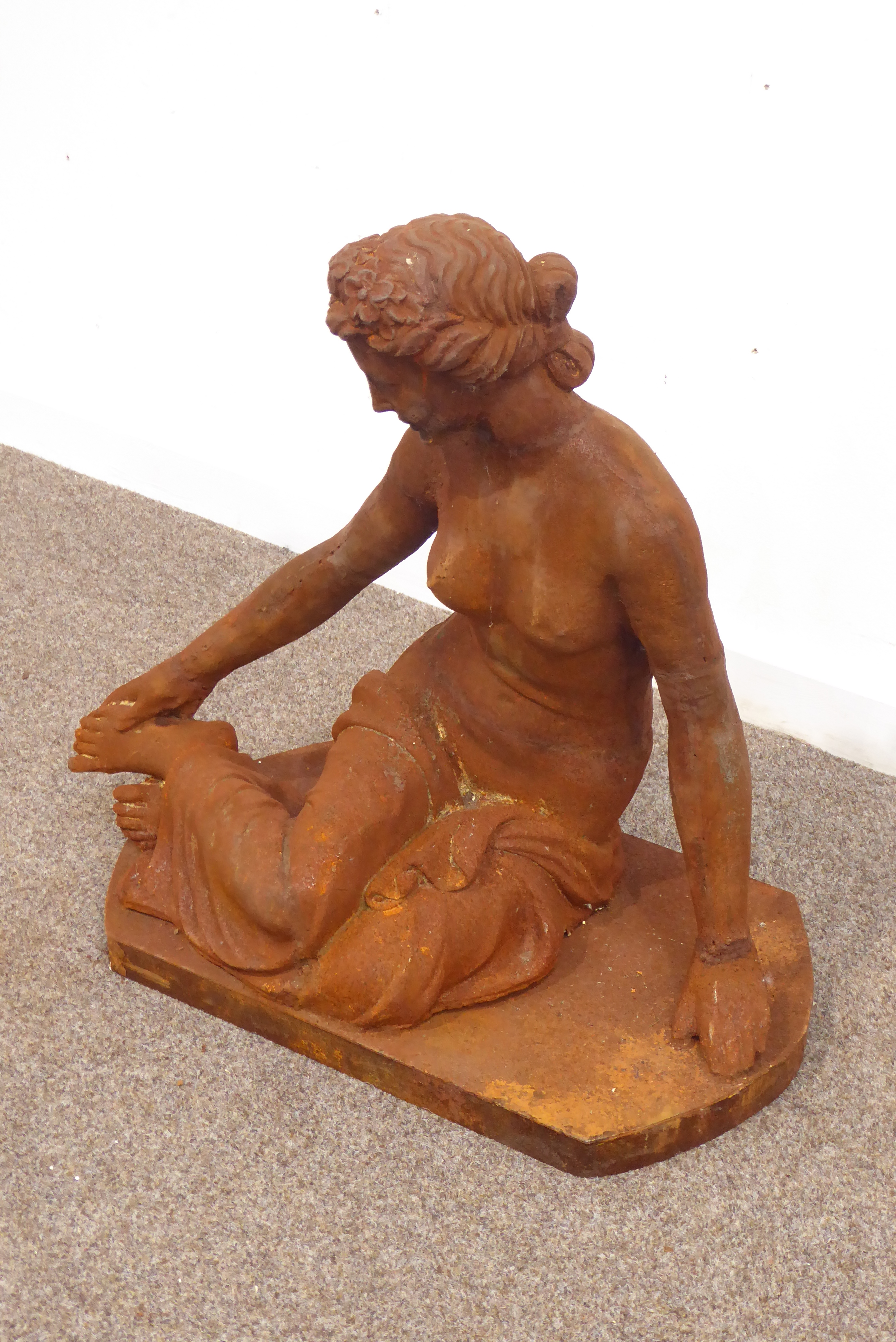 Cast iron classical garden figure of a semi-nude seated maiden, - Image 2 of 2