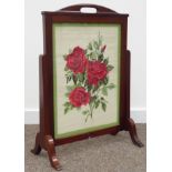 'Acornman' mahogany framed firescreen with needlework panel, carved with acorn signature,