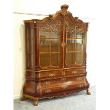 Dutch style figured walnut bombe display cabinet on chest,