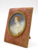 Indistinctly signed miniature oval head and shoulders portrait on ivory of a lady 6cm x 5cm