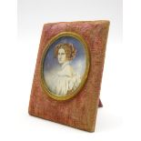 Indistinctly signed miniature oval head and shoulders portrait on ivory of a lady 6cm x 5cm