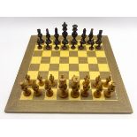Carved and pierced wooden chess set and wooden chess board 55cm x 55cm.