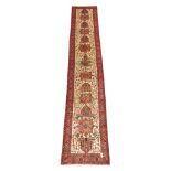 Persian Hamadan runner, ivory ground field decorated with thirteen medallions,