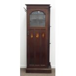 Arts & Crafts period oak hall wardrobe, stepped arch lead glazed door inlaid with figures,