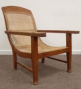 Early 20th century teak and caned plantation style armchair,