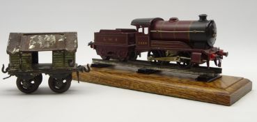 Hornby 'O' gauge clockwork 0-4-0 LMS locomotive and tender in maroon livery,