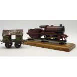 Hornby 'O' gauge clockwork 0-4-0 LMS locomotive and tender in maroon livery,