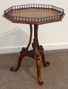 Theodore Alexander - walnut centre table, moulded octagonal leather inset top with brass gallery,