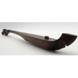 Tribal two stringed musical instrument with carved decoration,