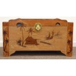 20th century camphor wood chest, oriental landscape carved in relief,